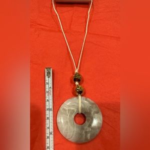 NWT Anthropology Marble, beige or bone color , with adjustable band